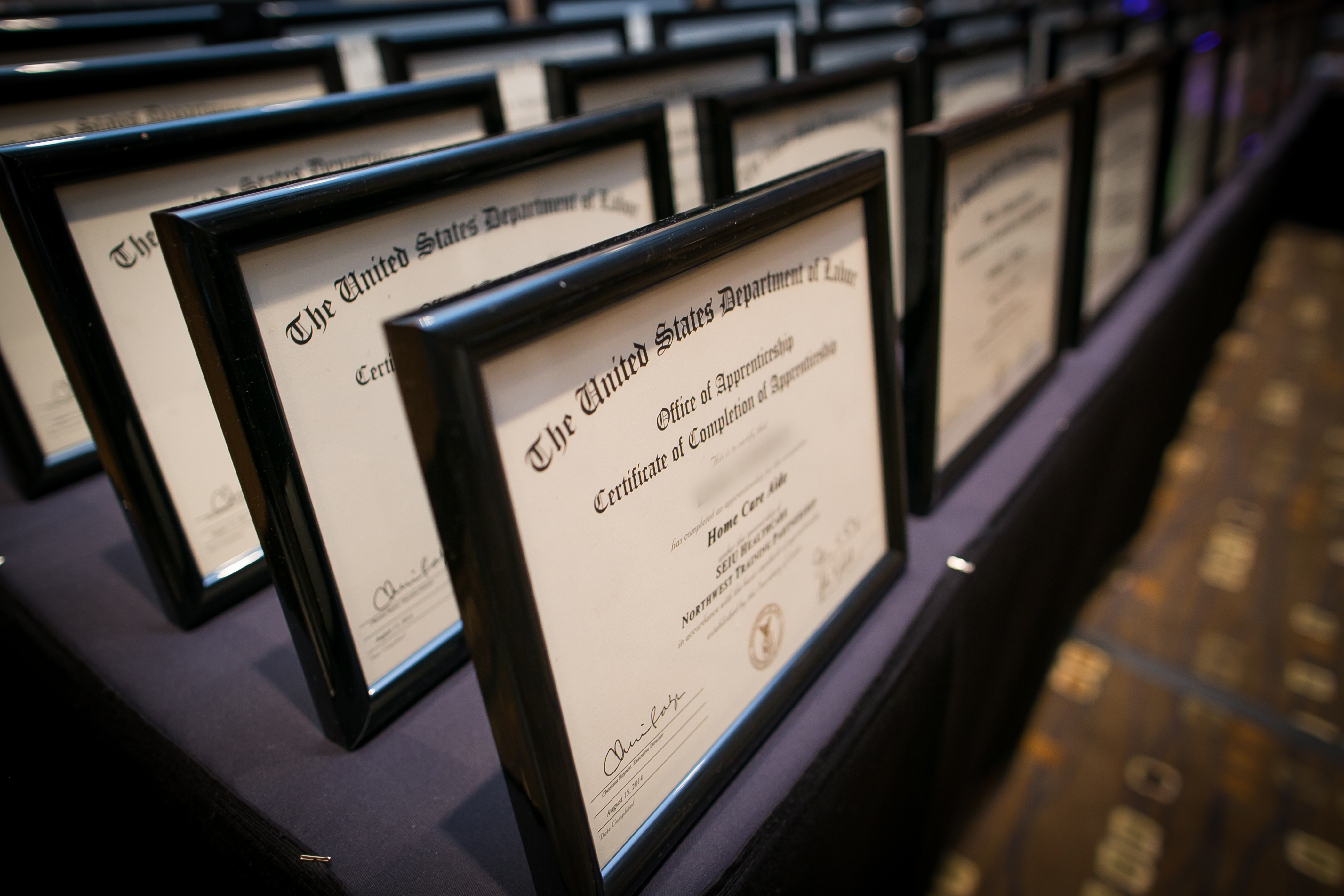 Diplomas at the National Apprenticeship Certification graduation